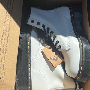 Brand New Dr. Marten boots.  Ordered online, too small, too late to return.